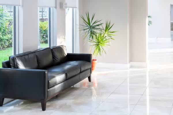 Marble-look tile flooring in a bright living room